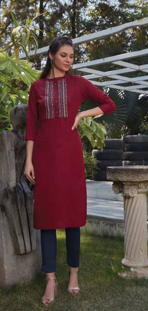 Grab This Readymade Straight Kurti In Maroon Color Fabricated On Rayon. It Is Beautified With Pretty Elegant Minimal Thread Embroidery. You Can Pair This Up With Same Or Contrasting Colored Leggings Or Pants. 