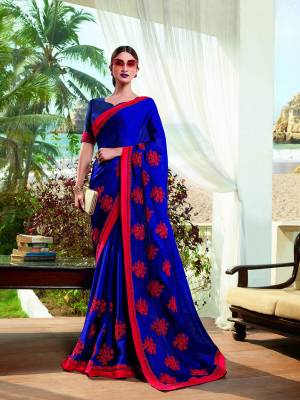 Shine Bright Wearing This Designer Saree In Royal Blue Color. This This Pretty Saree Is Fabricated On Satin Georgette Paired With Art Silk Fabricated Blouse. It Is Beautified With Contrasting Embroidery Giving An Attractive Look.