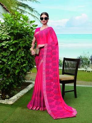 Catch All The Limelight Wearing This Bright And Appealing Designer Saree In Dark Pink Color. This Saree IS Chinon Based Paired With Art Silk Fabricated Blouse. Buy this Lovely Piece Now.