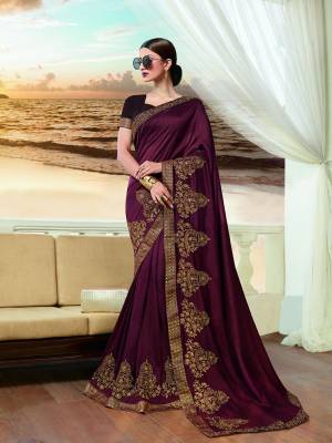 For A Royal Look, Grab This Designer Saree In Dark Maroon Color Paired With Dark Brown Colored Blouse. This Saree And Blouse Are Silk Based Beautified With Attractive Golden Colored Work. Its Rich Fabric And Color Will Give A Rich Look To Your Personality. 