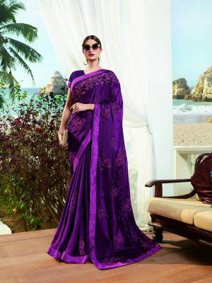 Shine Bright Wearing This Designer Saree In Purple Color. This This Pretty Saree Is Fabricated On Satin Georgette Paired With Art Silk Fabricated Blouse. It Is Beautified With Contrasting Embroidery Giving An Attractive Look.