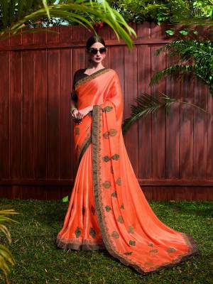 Shine Bright Wearing This Designer Saree In Orange Color. This This Pretty Saree Is Fabricated On Satin Georgette Paired With Art Silk Fabricated Blouse. It Is Beautified With Contrasting Embroidery Giving An Attractive Look.