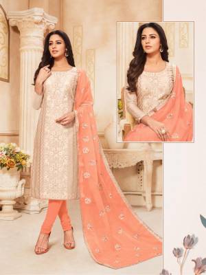 Simple And Elegant Looking Suit Here In Off-White Colored Top Paired With Light Orange Colored Bottom And Dupatta. Its Top Is Modal Silk Based Paired With Cotton Bottom And Orgenza Fabricated Embroidered Dupatta. Buy This Designer Straight Suit Now. 