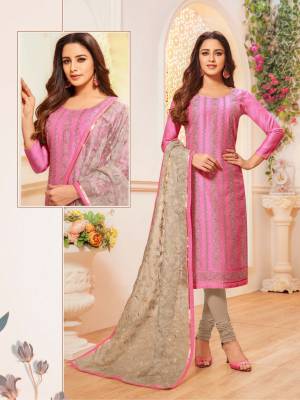 Simple And Elegant Looking Suit Here In Rani Pink Colored Top Paired With Grey Colored Bottom And Dupatta. Its Top Is Modal Silk Based Paired With Cotton Bottom And Orgenza Fabricated Embroidered Dupatta. Buy This Designer Straight Suit Now. 