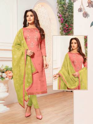 For Your Semi-Casual Wear Grab This Pretty Straight Cut Suit In Pink Colored Top Paired With Light Green Colored Bottom And Dupatta. Its Top And Bottom Are Cotton Based Paired With Net Fabricated Dupatta. Buy Now.