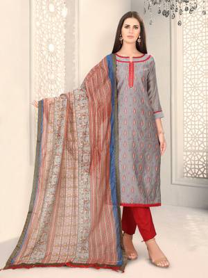 Add This Lovely Rich And Elegant Looking Chanderi Silk Based Designer Straight Suit To Your Wardrobe In Grey Color. Its Rich Fabric And Unique Color Pallete Will Definitely Earn You Lots Of Compliments From Onlookers. 