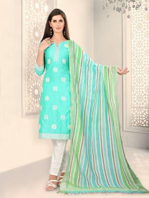 Add This Lovely Rich And Elegant Looking Chanderi Silk Based Designer Straight Suit To Your Wardrobe In Sea Green Color. Its Rich Fabric And Unique Color Pallete Will Definitely Earn You Lots Of Compliments From Onlookers. 