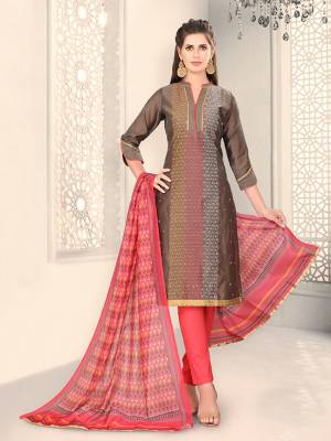 Add This Lovely Rich And Elegant Looking Chanderi Silk Based Designer Straight Suit To Your Wardrobe In Brown Color. Its Rich Fabric And Unique Color Pallete Will Definitely Earn You Lots Of Compliments From Onlookers. 