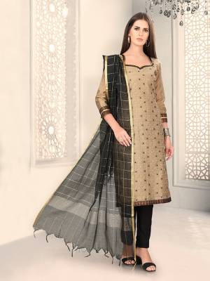 Add This Lovely Rich And Elegant Looking Chanderi Silk Based Designer Straight Suit To Your Wardrobe In Light Brown Color. Its Rich Fabric And Unique Color Pallete Will Definitely Earn You Lots Of Compliments From Onlookers. 