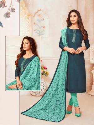 Here Is A Rich And Elegant Looking Designer Straight Suit In Navy Blue Colored Top Paired With Contrasting Turquoise Blue Colored Bottom And Dupatta. Its Top Is Fabricated On Soft Silk Paired With Cotton Bottom And Modal Silk Dupatta. 