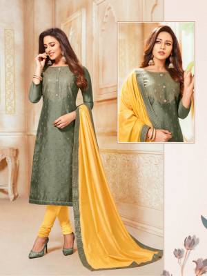 Grab This Pretty Designer Straight Suit In Olive Green Colored Top Paired With Contrasting Yellow Colored Bottom And Dupatta. Its Top Is Soft Silk Based Paired With Cotton Bottom And Chanderi Silk Fabricated Dupatta.