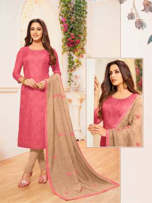 Here Is A Rich And Elegant Looking Designer Straight Suit In Pink Colored Top Paired With Beige Colored Bottom And Dupatta. Its Top Is Fabricated On Soft Silk Paired With Cotton Bottom And Modal Silk Dupatta. 