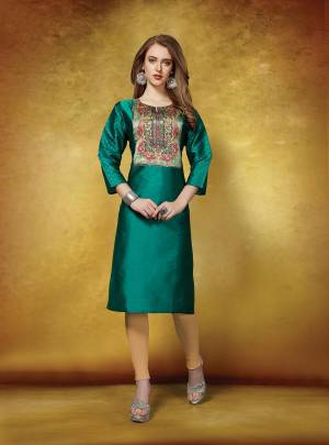 Here Is A Pretty Neck Printed Readymade Straight Kurti In Teal Green Color. This Kurti Is Fabricated On Tafeta Art Silk and Also Available In All Regular Sizes. Buy Now.