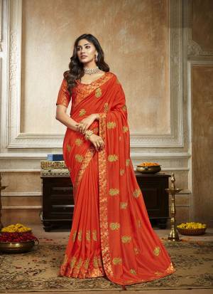 Grab This Pretty Attractive Saree In Orange Color. This Saree Is Fabricated On Soft Art Silk Paired With Brocade Fabricated Blouse. It Has Attractive Jari Embroidered Motifs Highlited With Stone Work. Its Rich Fabric And Color Will Earn You Lots Of Compliments From Onlookers.