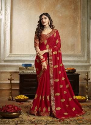Grab This Pretty Attractive Saree In Red Color. This Saree Is Fabricated On Soft Art Silk Paired With Brocade Fabricated Blouse. It Has Attractive Jari Embroidered Motifs Highlited With Stone Work. Its Rich Fabric And Color Will Earn You Lots Of Compliments From Onlookers.