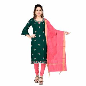 If Those Readymade Suit Does Not Lend You The Desired Comfort Than Grab This Simple Dres Material In Dark Green Georgette Based Top Paired With Dark Peach Colored Cotton Fabricated Bottom And Chanderi Dupatta. 