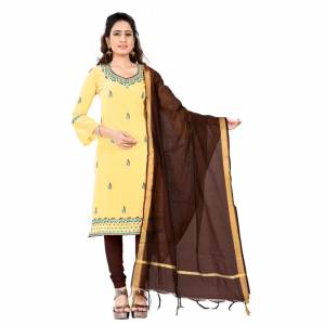 If Those Readymade Suit Does Not Lend You The Desired Comfort Than Grab This Simple Dres Material In Yellow Georgette Based Top Paired With Brown Colored Cotton Fabricated Bottom And Chanderi Dupatta. 
