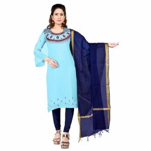 Grab This Pretty Simple Dress Material In Sky Blue Colored Top Paired With Contrasting Navy Blue Colored bottom And Dupatta. Its Embroidered Top Is Georgette Based Paired With Cotton Bottom And Chanderi Dupatta. Buy This Dress Material Now. 