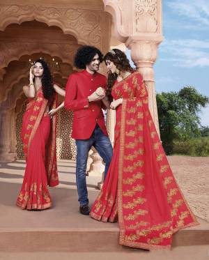 Add This Very Beautiful And Attractive Looking Designer Saree In Crimson Red Color Paired With Crimson Red Colored Blouse. This Saree And Blouse Are Silk Based Beautified With Attractive Work. 