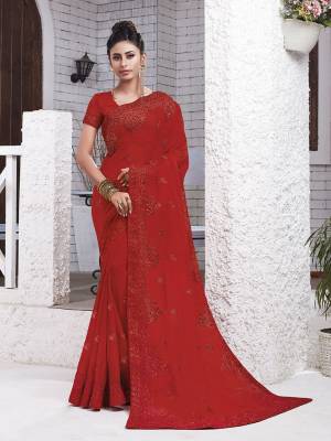Celebrate This Festive Season With Beauty And Comfort Wearing This Pretty Light Weight Embroidered Saree In Red Color. This Saree Is Chiffon Based Paired With Art Silk Fabricated Blouse. Buy Now.