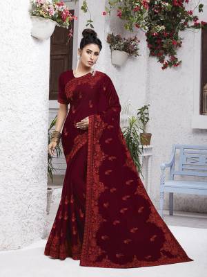 Celebrate This Festive Season With Beauty And Comfort Wearing This Pretty Light Weight Embroidered Saree In Maroon Color. This Saree Is Chiffon Based Paired With Art Silk Fabricated Blouse. Buy Now.