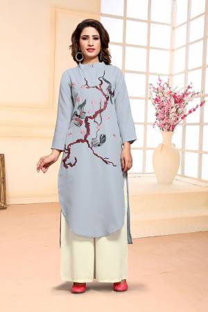Add This Designer Dress Material In Baby Blue colored Top Paired With White Colored Bottom. Its Top Is cotton Based Paired With Muslin Bottom. Buy This Pretty Thread Embroidered Dress Material Now.