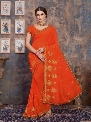 Celebrate This Festive Season With Beauty And Comfort Wearing This?Pretty Elegant Designer Saree In Orange Color. This Saree And Blouse Are Fabricated On Georgette Beautified With Jari Embroidery And Tone To Tone Resham Work. Buy Now.