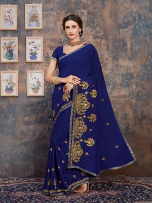 Celebrate This Festive Season With Beauty And Comfort Wearing This?Pretty Elegant Designer Saree In Royal Blue Color. This Saree And Blouse Are Fabricated On Georgette Beautified With Jari Embroidery And Tone To Tone Resham Work. Buy Now.