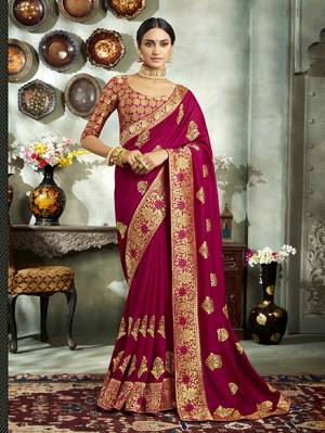 Celebrate This Festive Season With Beauty And Comfort Wearing This Durable And Light Weight Designer Saree In Magenta Pink Color. This Saree Is Fabricated On Art Silk Paired With Brocade Fabricated Blouse. Buy Now.