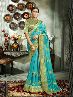 Grab This Pretty Attractive Saree In Sky Blue Color. This Saree?Is Fabricated On Art Silk Paired With Brocade Fabricated Blouse. It Has Attractive Jari Embroidered Motifs With Detailed Weaved Broad Border. Its Rich Fabric And Color Will Earn You Lots Of Compliments From Onlookers.