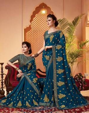 Grab This Pretty Attractive Saree In Blue Color. This Saree Is?Fabricated On Soft Art Silk Paired With Brocade Fabricated Blouse. It Has Attractive Jari Embroidered Motifs Highlited With Stone Work. Its Rich Fabric And Color Will Earn You Lots Of Compliments From Onlookers.