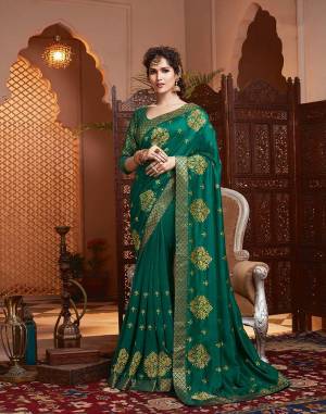 Grab This Pretty Attractive Saree In Sea Green Color. This Saree Is?Fabricated On Soft Art Silk Paired With Brocade Fabricated Blouse. It Has Attractive Jari Embroidered Motifs Highlited With Stone Work. Its Rich Fabric And Color Will Earn You Lots Of Compliments From Onlookers.
