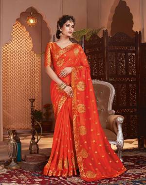 Grab This Pretty Attractive Saree In Orange Color. This Saree Is?Fabricated On Soft Art Silk Paired With Brocade Fabricated Blouse. It Has Attractive Jari Embroidered Motifs Highlited With Stone Work. Its Rich Fabric And Color Will Earn You Lots Of Compliments From Onlookers.