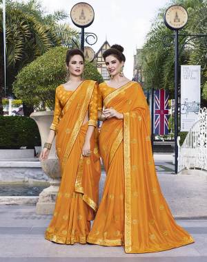 Grab This Pretty Attractive Saree In Musturd Yellow Color. This Saree Is Fabricated On Art Silk Paired With Jacquard Silk Fabricated Blouse. It Has Attractive Jari Embroidered Motifs With Detailed Weaved Broad Border. Its Rich Fabric And Color Will Earn You Lots Of Compliments From Onlookers.