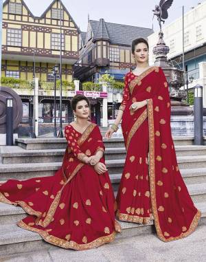 Celebrate This Festive Season With Beauty And Comfort Wearing This Durable And Light Weight Designer Saree In Red Color. This Saree Is Fabricated On Art Silk Paired With Jacquard Silk Fabricated Blouse. Buy Now