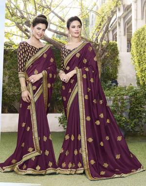 Celebrate This Festive Season With Beauty And Comfort Wearing This Durable And Light Weight Designer Saree In Wine Color. This Saree Is Fabricated On Art Silk Paired With Jacquard Silk Fabricated Blouse. Buy Now