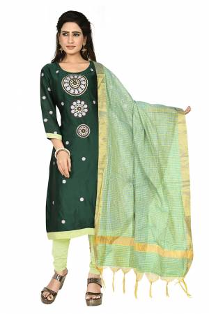 Simple And Elegant Suit Is Here For Your Casual Or Semi-Casual Wear. This Pretty Dress Materal Is In Shades Of Green Color. Its Top Is Satin Georgette Based Paired With Santoon Bottom And Chanderi Dupatta.
