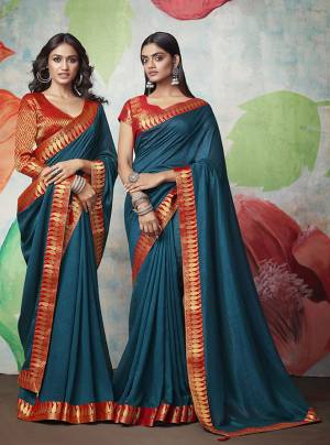 Add Some Rich And Elegant looking Simple Yet Designer Saree In Blue Color Paired With Contrasting Red Colored Blouse. This Saree Is Fabricated On Art Silk Paired with Jacquard Silk Fabricated Blouse. Buy Now.