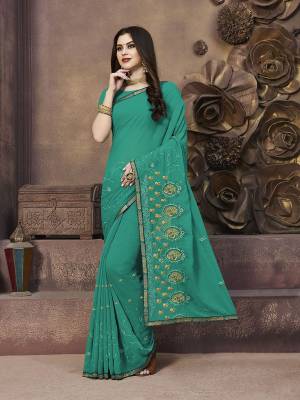 For Your Semi-Casual Wear, Grab This Pretty Saree In Sea Green?Color. This Saree And Blouse Are Georgette Based With A Minimal Of Embroidery Work With Jari & Thread.