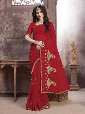 Celebrate This Festive Season With Beauty And Comfort Wearing This Pretty Elegant Designer Saree In Red Color. This Saree And Blouse Are Fabricated On Georgette Beautified With Jari Embroidery And Thread Work.