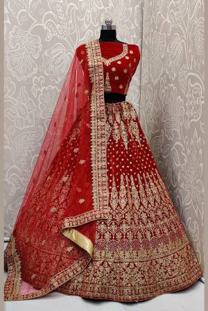 Look Pretty In This Every Girl's Favourite Color For Bridal Wear In All Over Red Colored Lehenga Choli. This Very Beautiful Heavy Designer Lehenga Choli Is Fabricated on Velvet Paired With Net Fabricated Dupatta. Buy Now. Its Attractive Embroidery And Color Will Definitlely Earn You Lots Of Compliments From Onlookers.