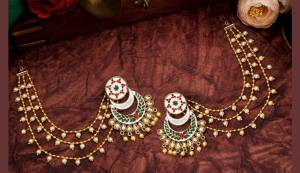Grab This Heavy Designer Earrings For The Upcoming Wedding Season. The New Trendy And Designer Earrings Can Be Paired With Any Kind Of Ethnic Attire. Also It Will Earn You Lots Of Compliments From Onlookers. 
