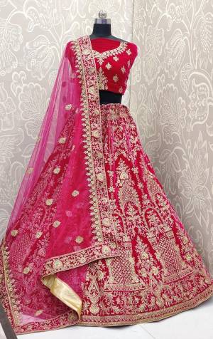 Look Pretty In This Every Girl's Favourite Color For Bridal Wear?In All Over Rani Pink Colored Lehenga Choli. This Very Beautiful Heavy Designer Lehenga Choli Is Fabricated on Velvet Paired With Net Fabricated Dupatta. Buy Now. Its Attractive Embroidery And Color Will Definitlely Earn You Lots Of Compliments From Onlookers.