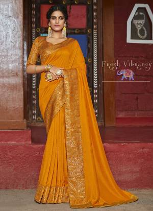 Celebrate This Festive Season With Beauty And Comfort Wearing This Simple And Elegant Looking Designer Saree In Musturd Yellow Color. This Saree Is Silk Based Paired With Jacquard Silk Fabricated Blouse