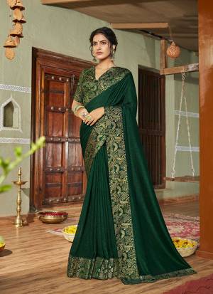 Celebrate This Festive Season With Beauty And Comfort Wearing This Simple And Elegant Looking Designer Saree In Dark Green Color. This Saree Is Silk Based Paired With Jacquard Silk Fabricated Blouse
