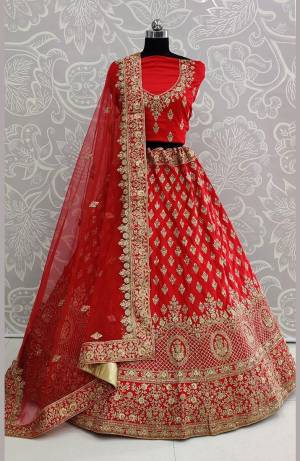 Catch All The Limelight At The Next Wedding You Attend Wearing This Heavy Designer Lehenga Choli In All Over Red Color. This Lehenga Choli Is Satin Silk Based Paired With Net Fabricated Dupatta.