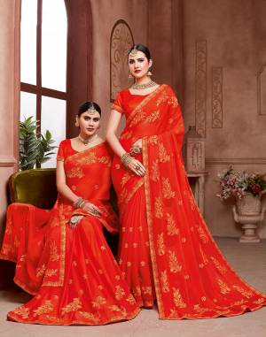 Celebrate This Festive Season With Beauty And Comfort Wearing This?Pretty Light Weight Embroidered Saree In Orange Color. This Saree Is Chiffon Based Paired With Art Silk Fabricated Blouse. Buy Now