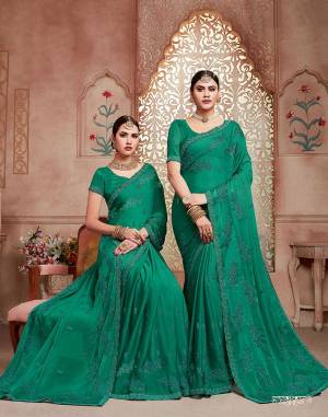 Enhance Your Personality Wearing This Designer Saree In Sea Green Color. This Pretty Resham Embroidered Saree Is Fabricated On Chiffon Paired With Art Silk Fabricated Blouse. It Is Highlited With Pretty Stone Work Which Gives An Attractive Yet Elegant Look.