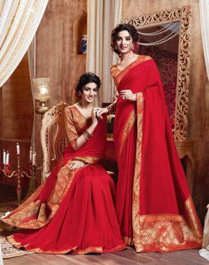 Celebrate This Festive Season With Beauty And Comfort Wearing This Simple And Elegant Looking Designer Saree In Red Color. This Saree Is Silk Based Paired With Jacquard Silk Fabricated Blouse