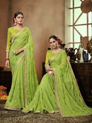 Pretty Simple And Elegant Looking Designer Saree Is Here In Parrot Green Color. This Pretty Motif Embroidred Saree Is Chiffon Based Paired with Brocade Fabricated Blouse. Buy This Pretty Saree Now.